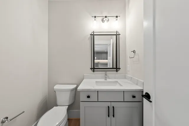 a view of a sink with cabinets