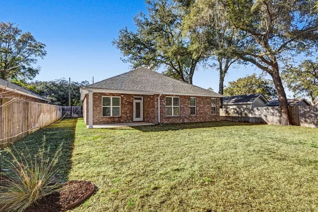 a house view with a garden space