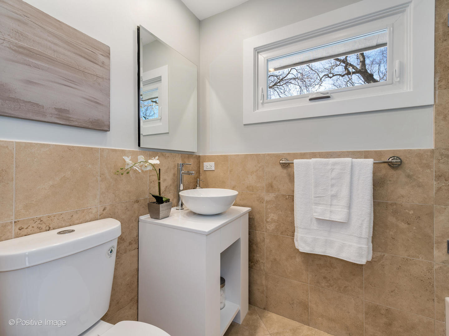 1906 Berkeley Road Highland Park, IL 60035 - Photo 16 of 28 a bathroom with a sink and a toilet