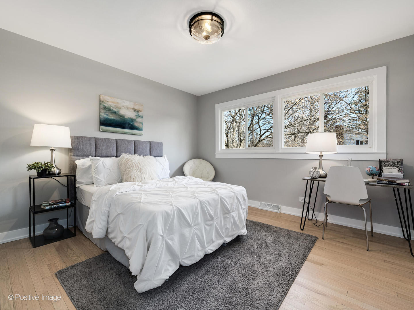 1906 Berkeley Road Highland Park, IL 60035 - Photo 17 of 28 a spacious bedroom with two beds and a table