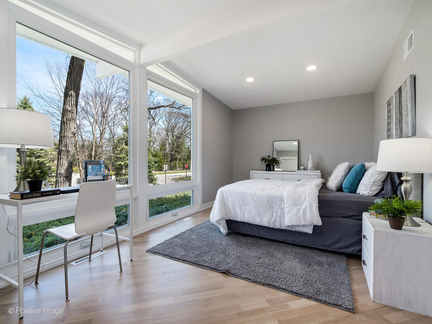 1906 Berkeley Road Highland Park, IL 60035 - Photo 18 of 28 a bedroom with a large bed and a large window