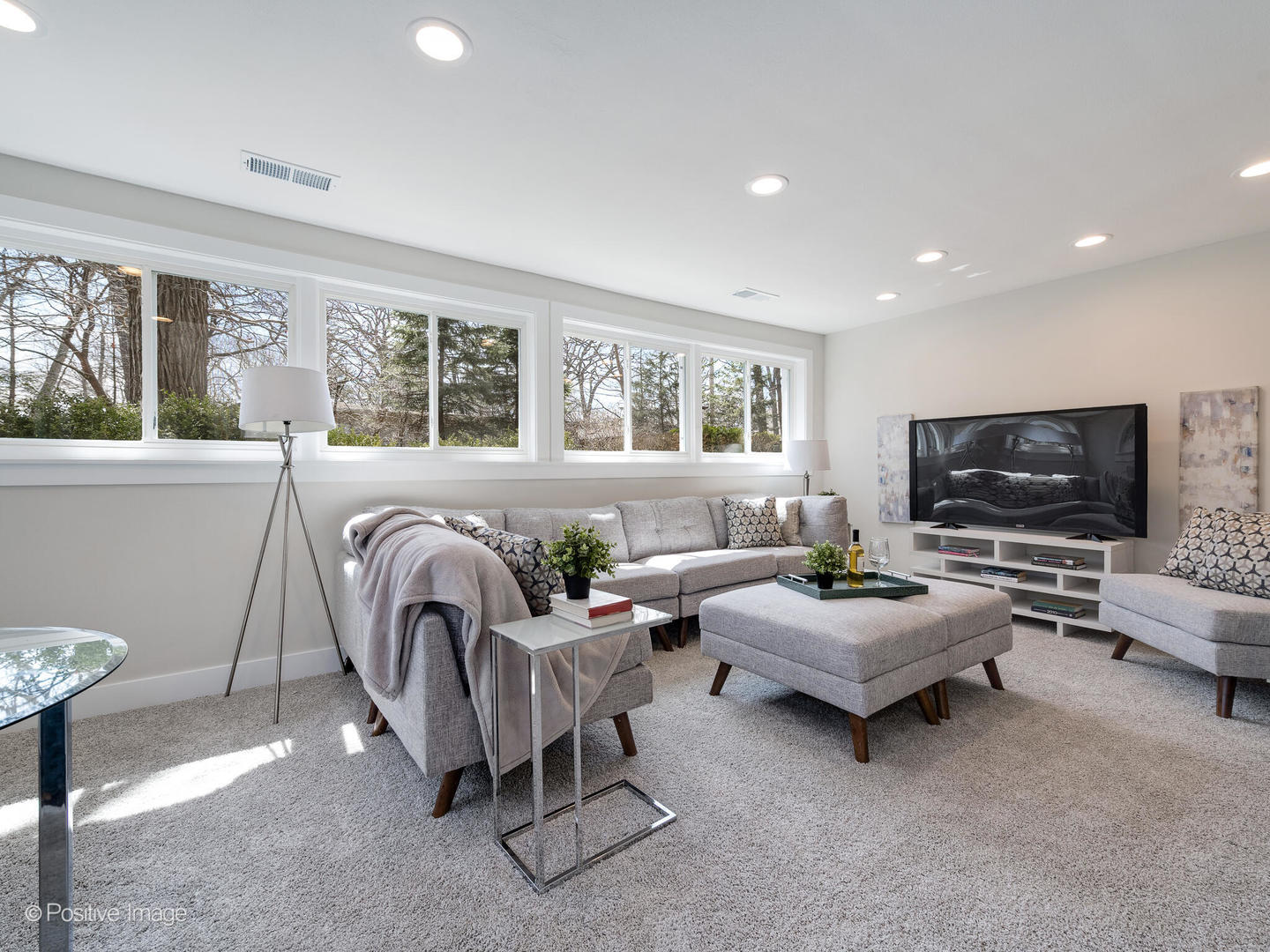 1906 Berkeley Road Highland Park, IL 60035 - Photo 21 of 28 a living room with furniture and a flat screen tv