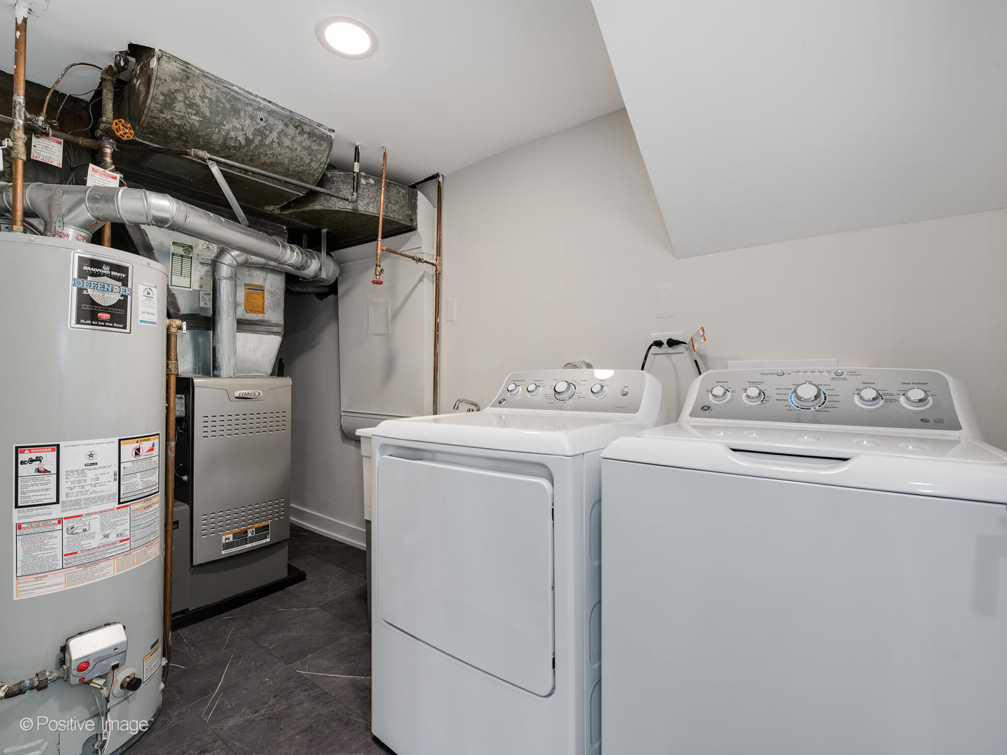 1906 Berkeley Road Highland Park, IL 60035 - Photo 26 of 28 a utility room with dryer and washer
