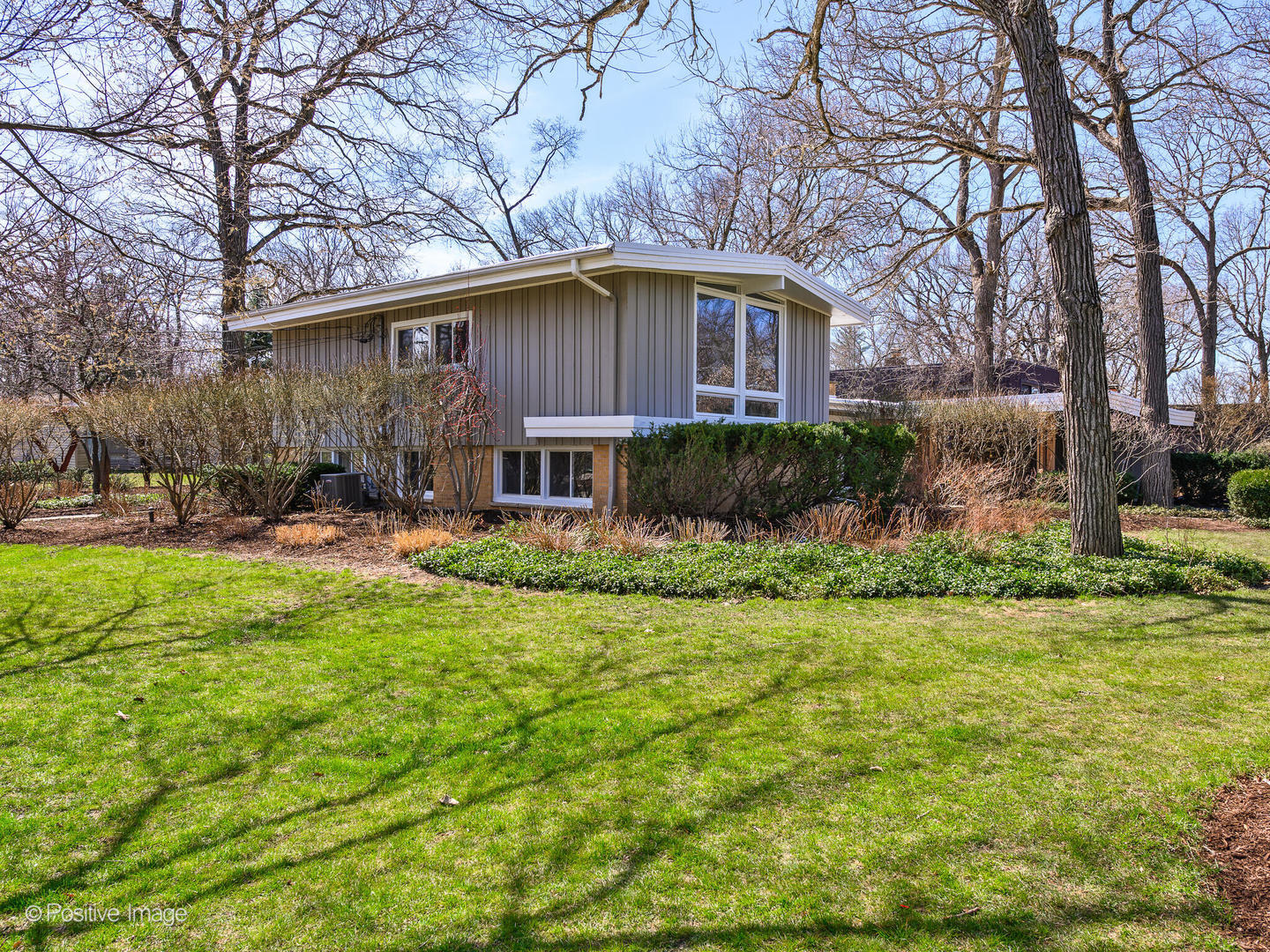 1906 Berkeley Road Highland Park, IL 60035 - Photo 27 of 28 a front view of a house with a yard