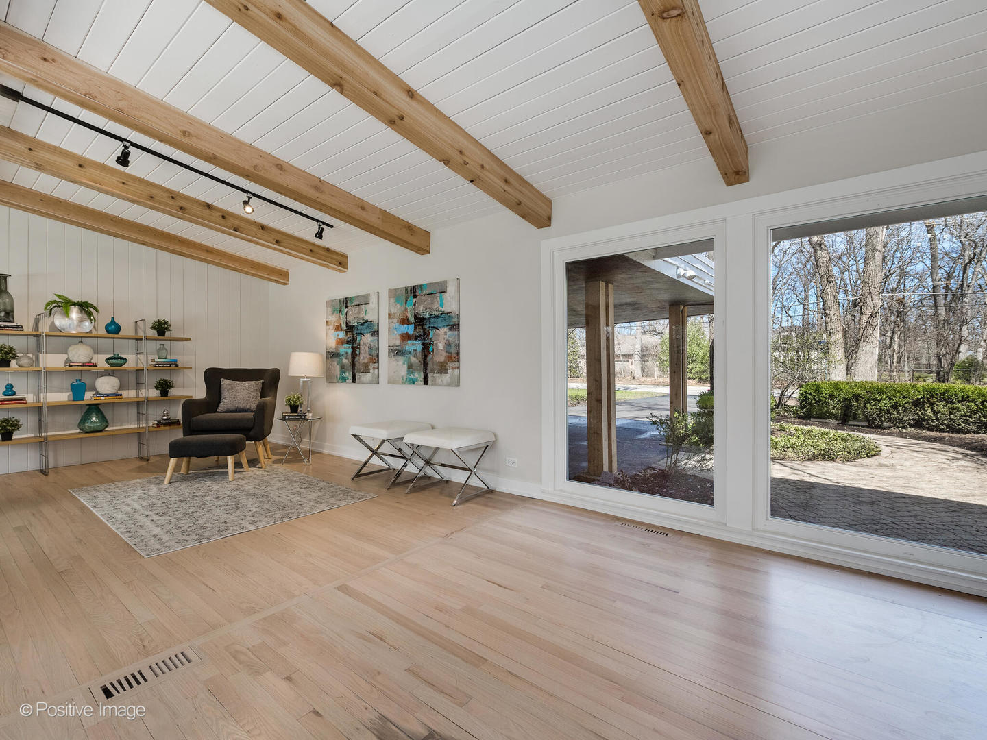 1906 Berkeley Road Highland Park, IL 60035 - Photo 8 of 28 a view of a room with gym equipment and floor to ceiling window