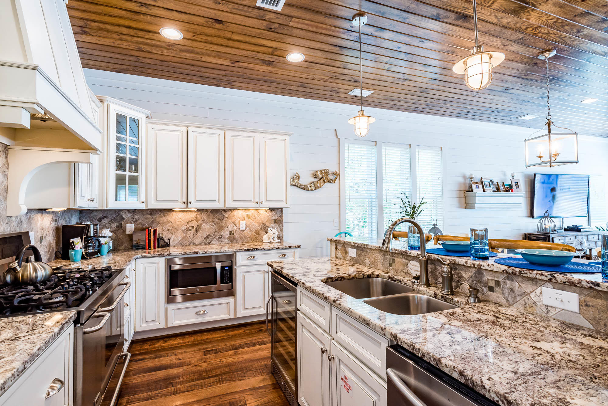 110 Gulf Point Road Santa Rosa Beach, FL 32459 - Photo 16 of 39 a kitchen with stainless steel appliances granite countertop a sink and stove