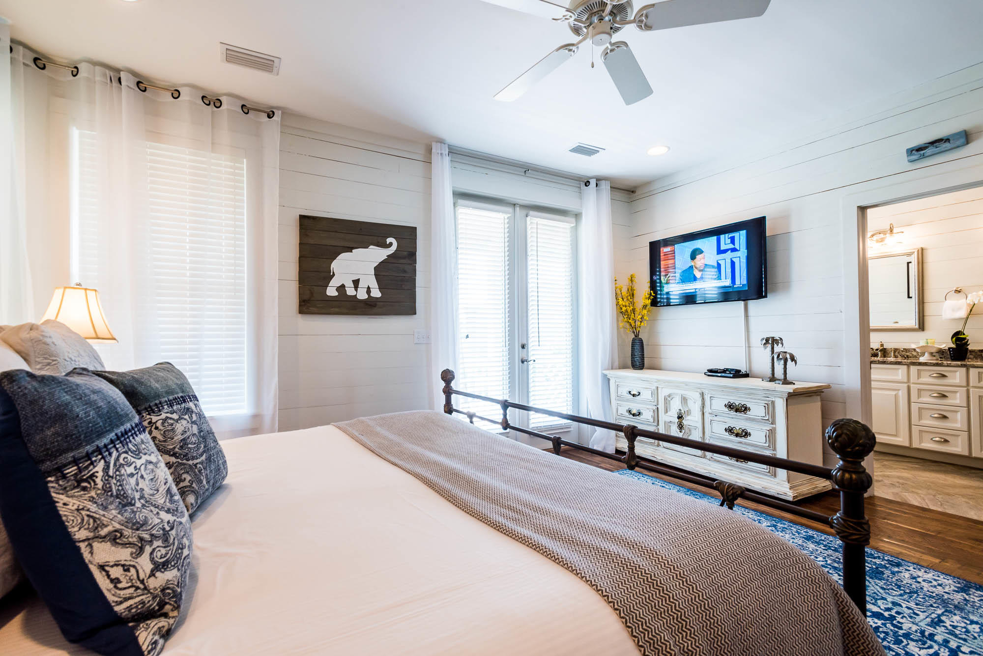 110 Gulf Point Road Santa Rosa Beach, FL 32459 - Photo 29 of 39 a bedroom with a bed a couch and a window