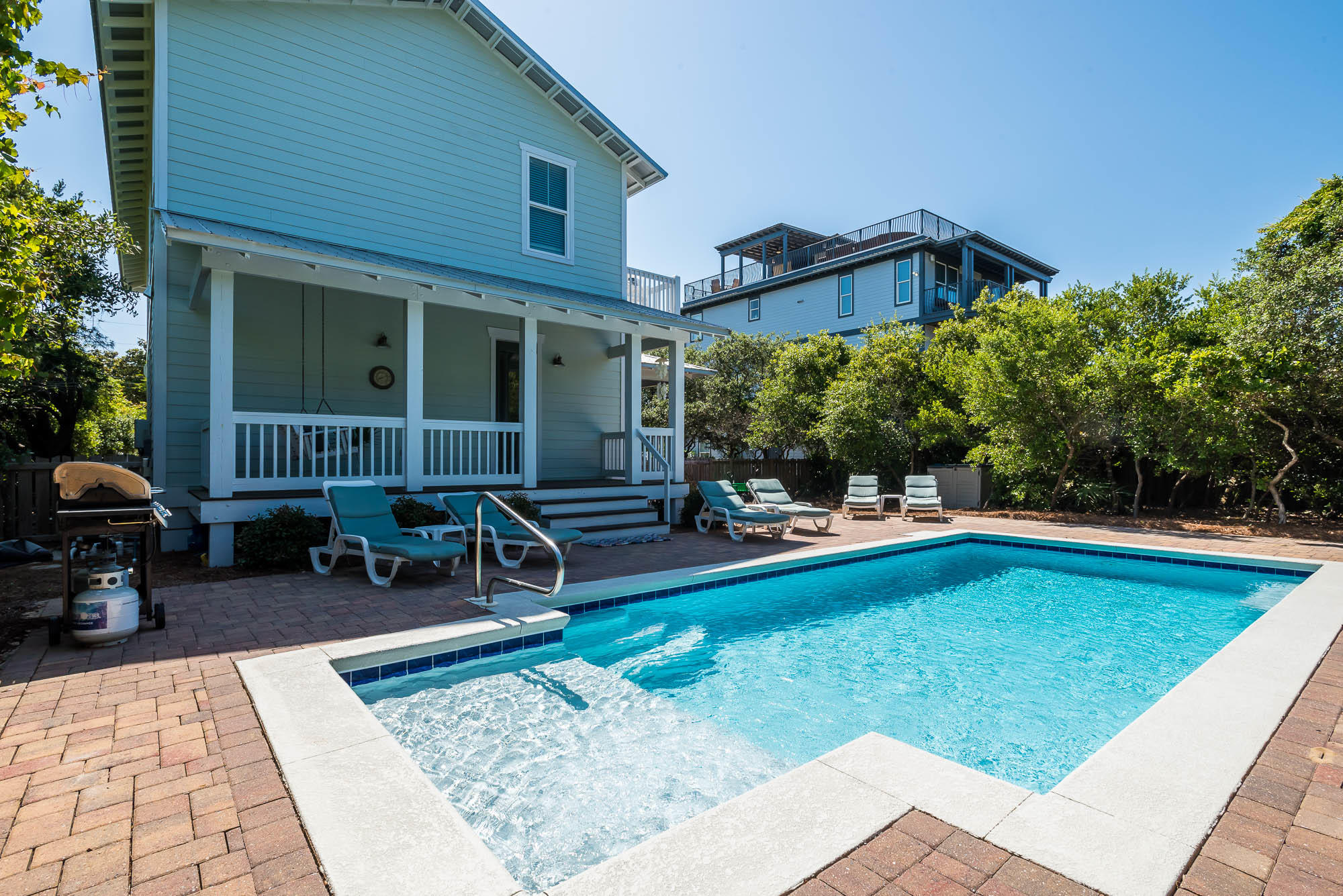 110 Gulf Point Road Santa Rosa Beach, FL 32459 - Photo 3 of 39 a view of a house with swimming pool and sitting area