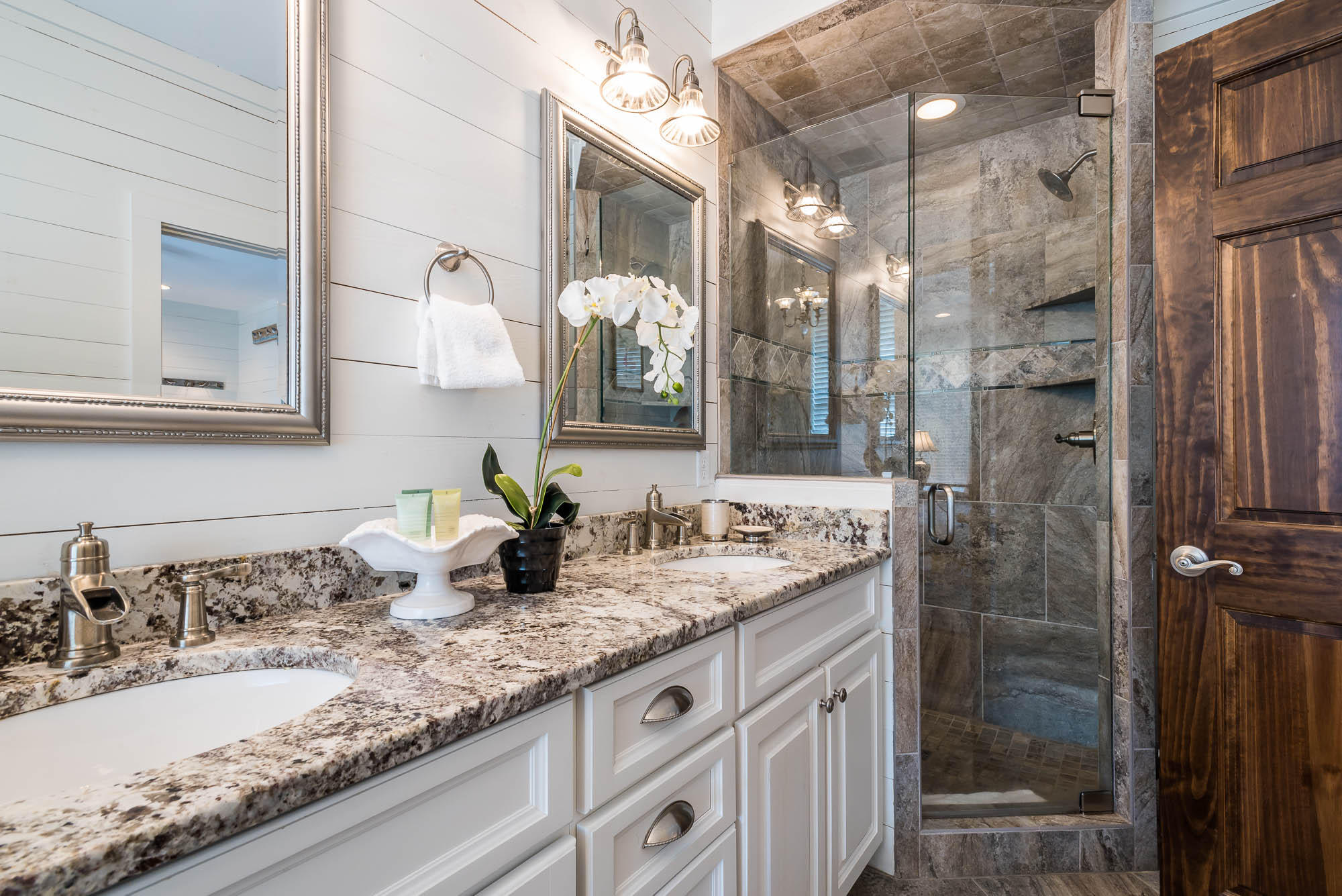 110 Gulf Point Road Santa Rosa Beach, FL 32459 - Photo 31 of 39 a bathroom with a granite countertop sink a mirror and shower
