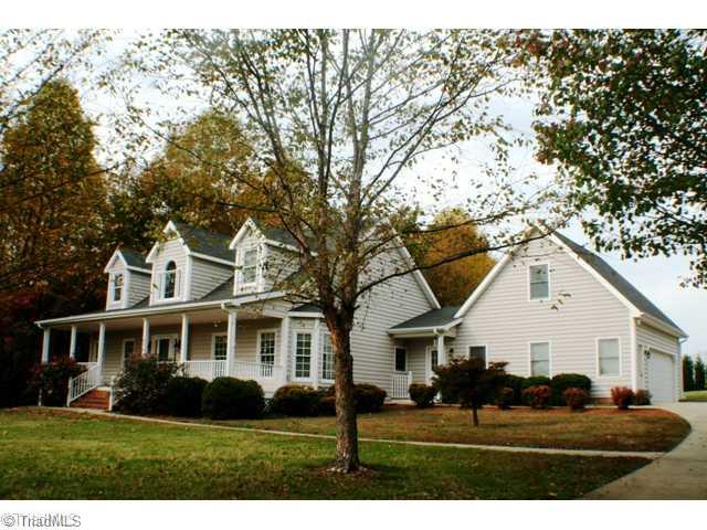 5703 Fox Hound Drive Oak Ridge, NC 27310 - Photo 1 of 16 Exterior Front.