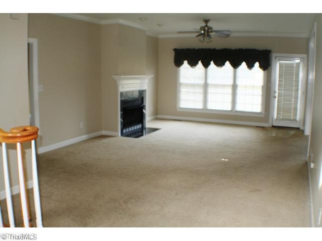 5703 Fox Hound Drive Oak Ridge, NC 27310 - Photo 2 of 16 Den/Family/Great Room.