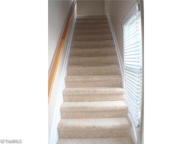 5703 Fox Hound Drive Oak Ridge, NC 27310 - Photo 14 of 16 Other. Back Staircase to Bonus