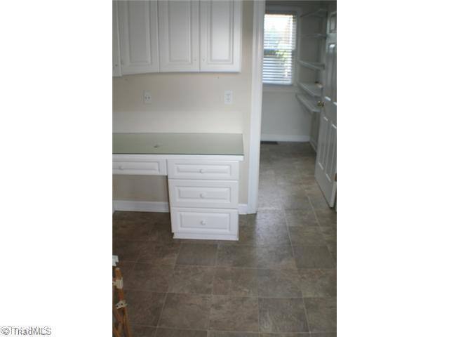 5703 Fox Hound Drive Oak Ridge, NC 27310 - Photo 15 of 16 Laundry Room. Laundry/Mud Room on Main Level