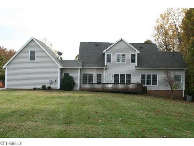 5703 Fox Hound Drive Oak Ridge, NC 27310 - Photo 16 of 16 Exterior Back.