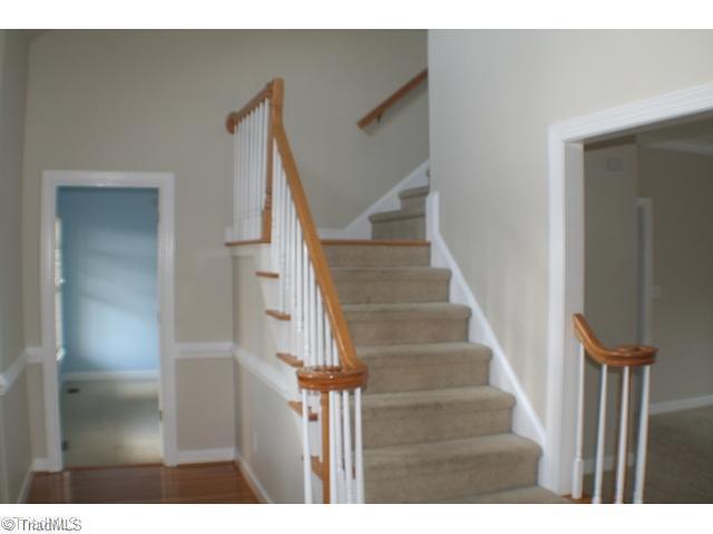 5703 Fox Hound Drive Oak Ridge, NC 27310 - Photo 7 of 16 Other. Main Staircase