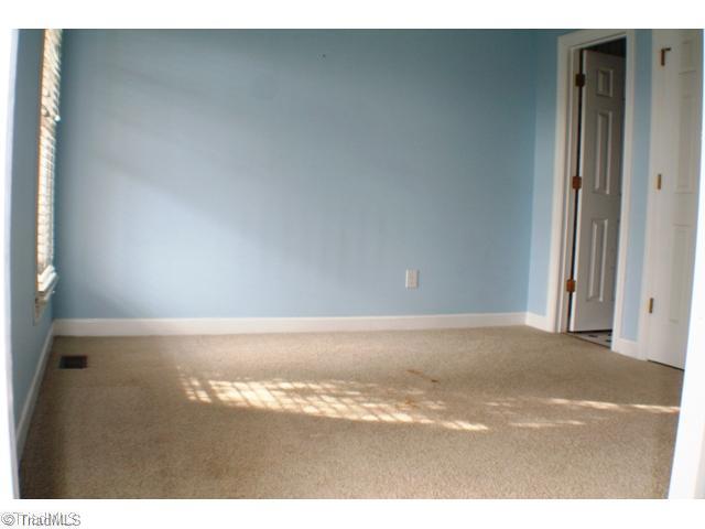 5703 Fox Hound Drive Oak Ridge, NC 27310 - Photo 8 of 16 2nd Bedroom. Main Level BR with Full Bath