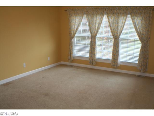 5703 Fox Hound Drive Oak Ridge, NC 27310 - Photo 9 of 16 Master Bedroom.