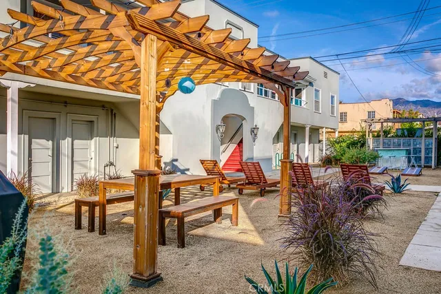 a bedroom with a bed and a fireplace