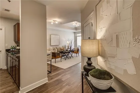 a room with furniture and wooden floor
