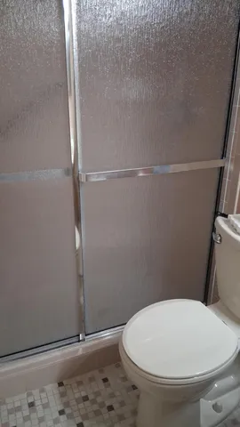 a view of a living room and a window