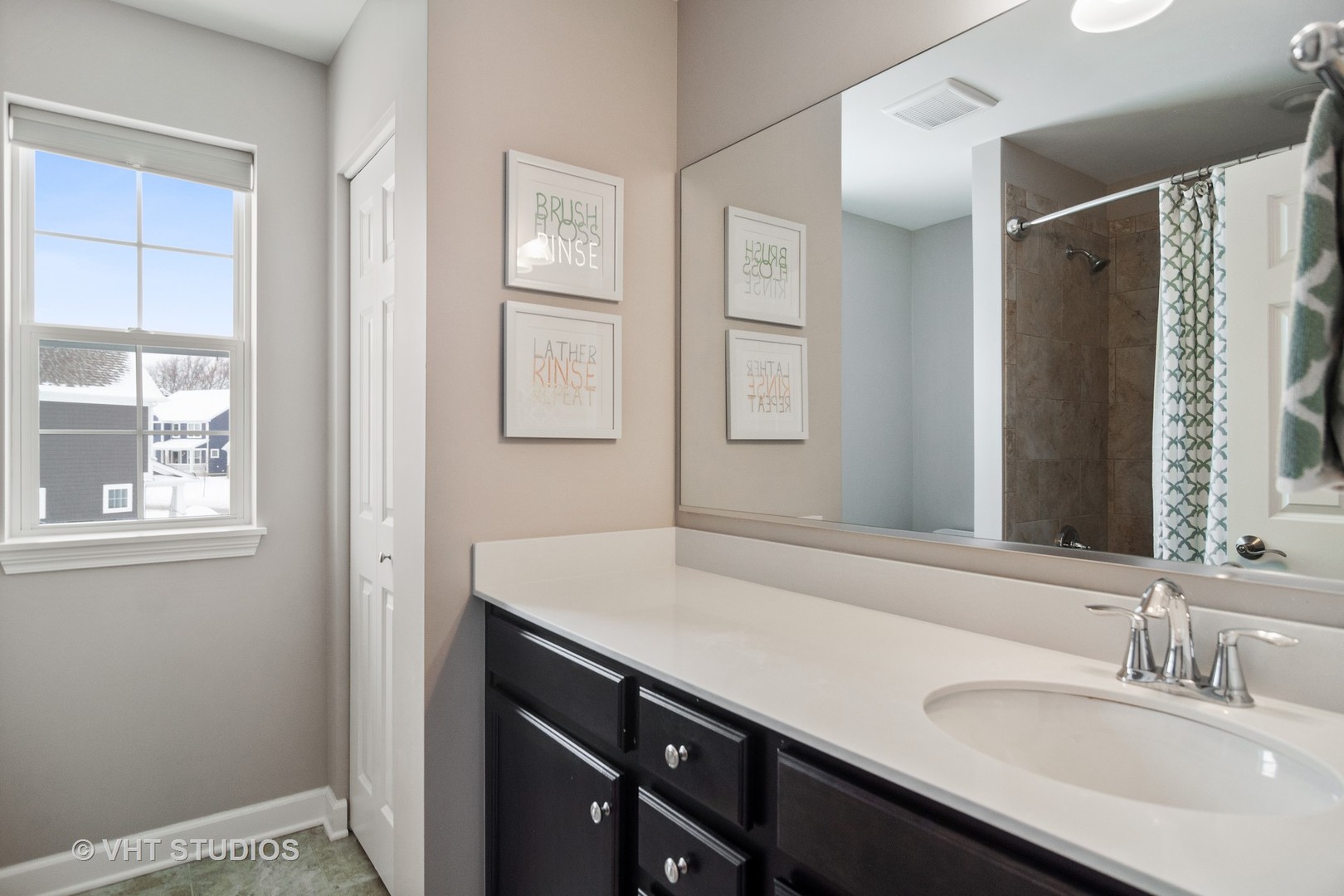3577 Harold Circle Hoffman Estates, IL 60192 - Photo 21 of 32 a bathroom with a sink and a mirror