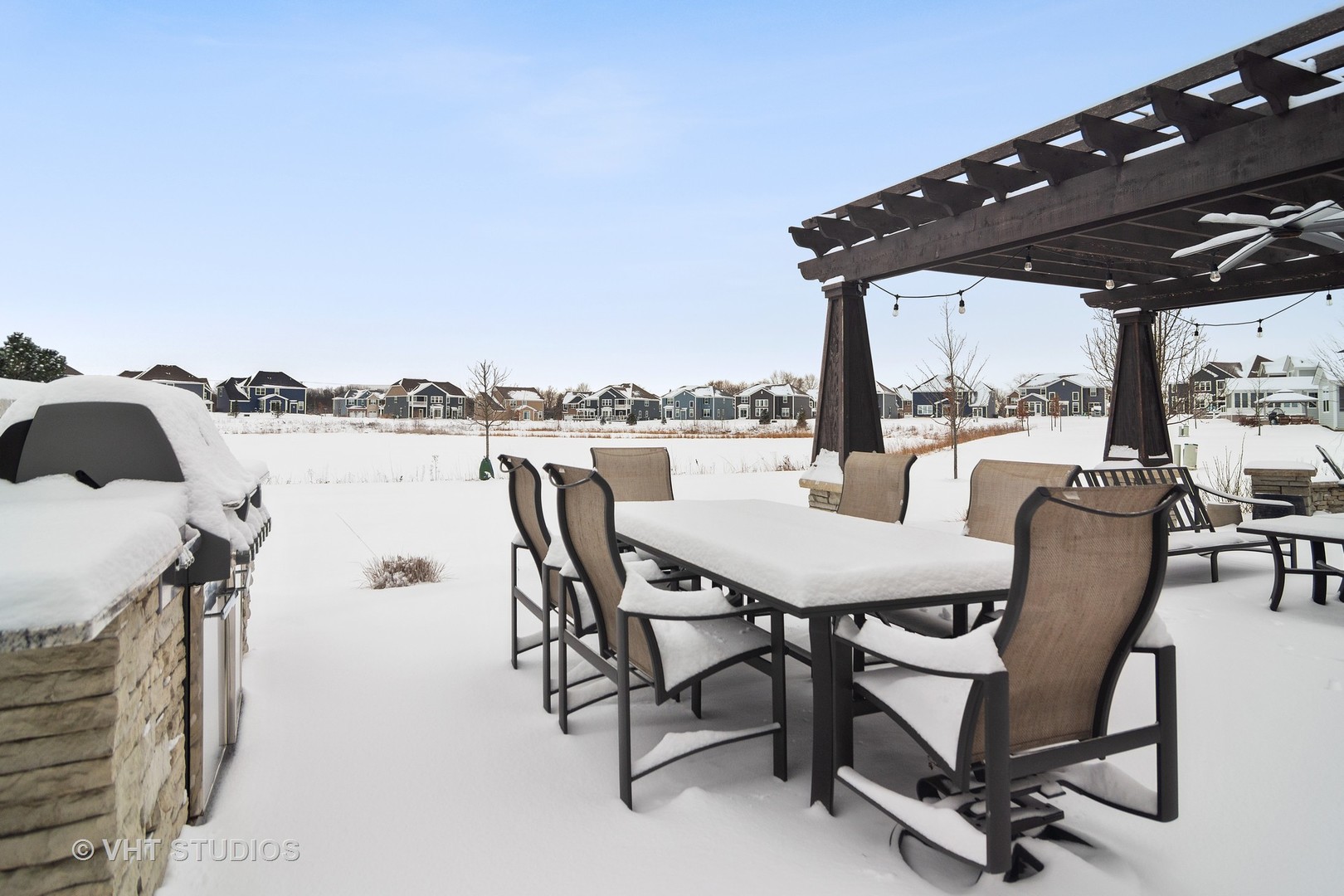 3577 Harold Circle Hoffman Estates, IL 60192 - Photo 24 of 32 a view of a patio with table and chairs a barbeque with wooden floor and fence