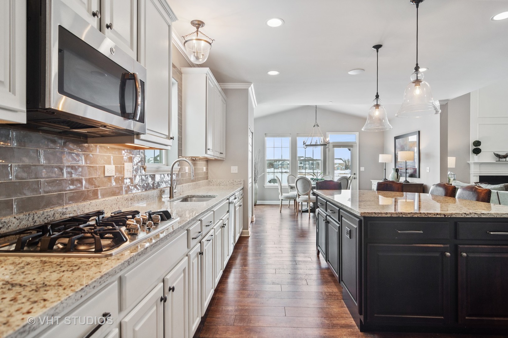3577 Harold Circle Hoffman Estates, IL 60192 - Photo 7 of 32 a kitchen with lots of counter top space stove sink and cabinets