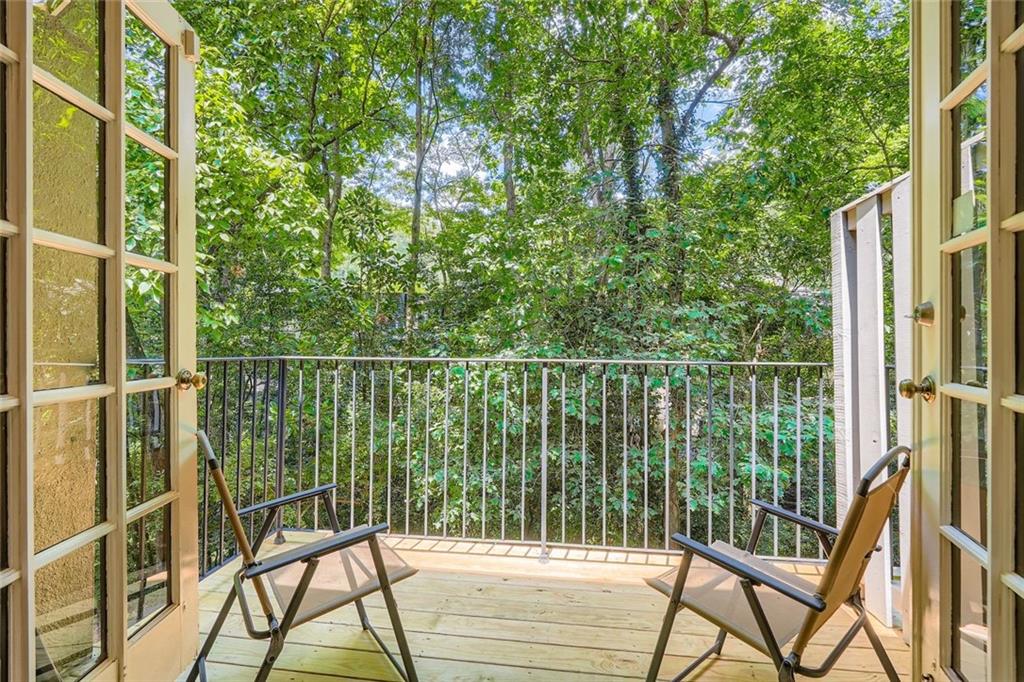 81 La Rue Place Northwest Atlanta, GA 30327 - Photo 23 of 24 a balcony with with a swing