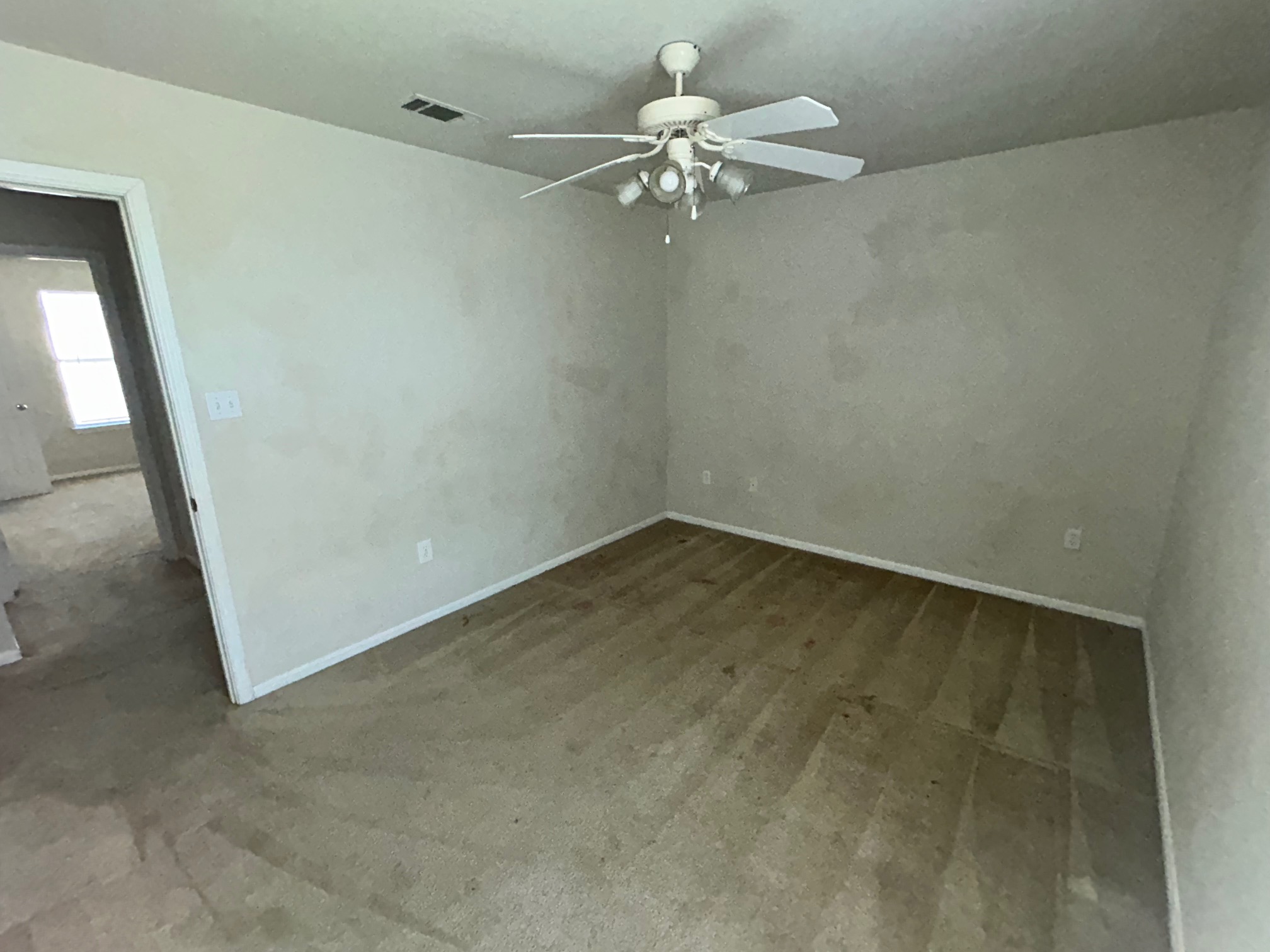 3104 Yaupon Road Copperas Cove, TX 76522 - Photo 7 of 9 Empty room with a ceiling fan and baseboards