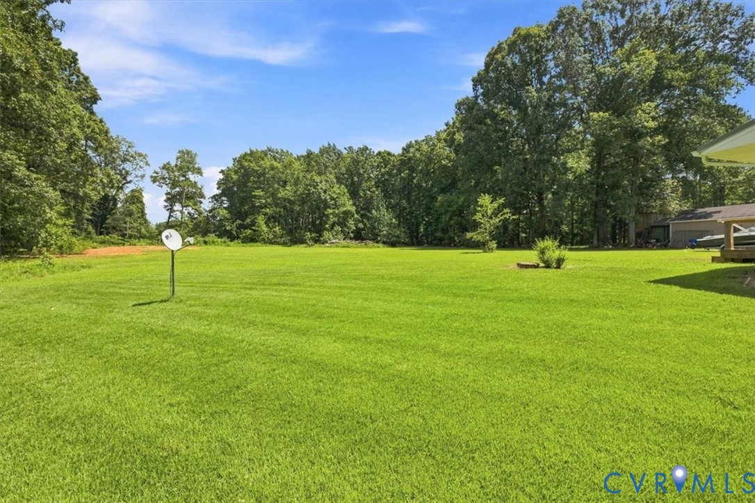 2338 George's Road Powhatan, VA 23139 - Photo 24 of 25 Expansive green lawn with mature perimeter trees