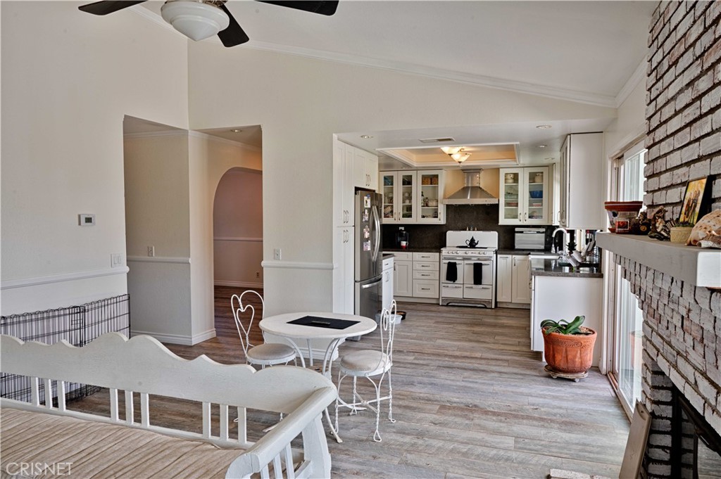 33342 Trail Ranch Road Agua Dulce, CA 91390 - Photo 18 of 40 a living room with furniture and view of kitchen