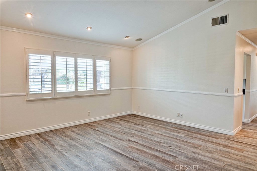 33342 Trail Ranch Road Agua Dulce, CA 91390 - Photo 27 of 40 wooden floor in an empty room with a window