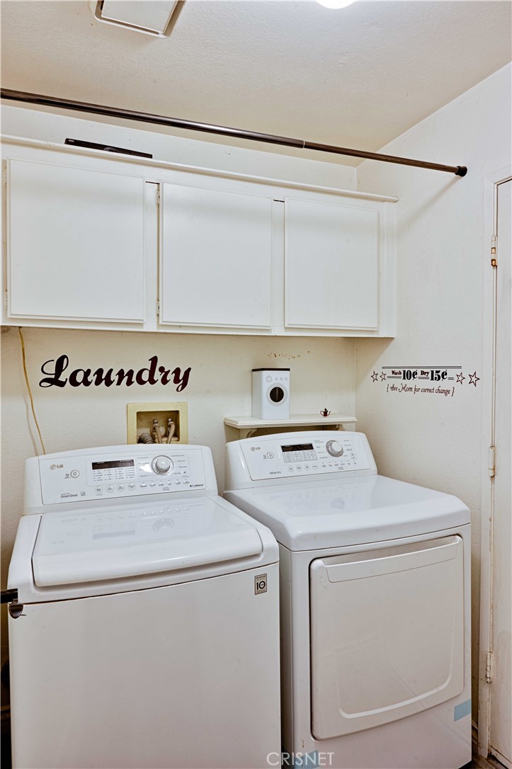 33342 Trail Ranch Road Agua Dulce, CA 91390 - Photo 36 of 40 a utility room with dryer and washer