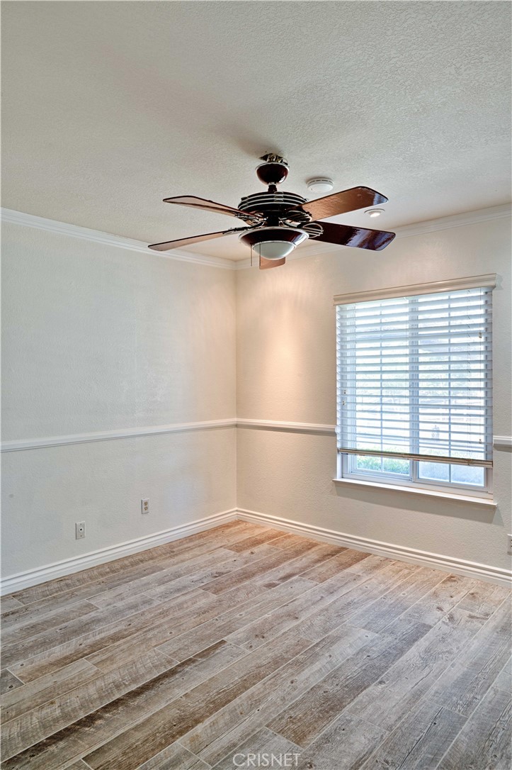 33342 Trail Ranch Road Agua Dulce, CA 91390 - Photo 37 of 40 a view of a room with wooden floor and a window