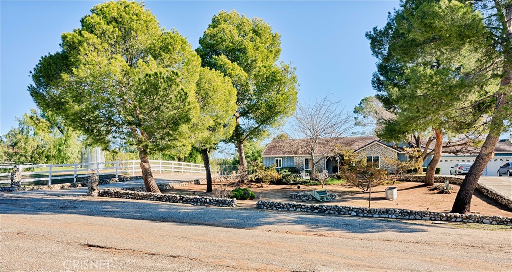33342 Trail Ranch Road Agua Dulce, CA 91390 - Photo 4 of 40 a view of a town with trees and houses