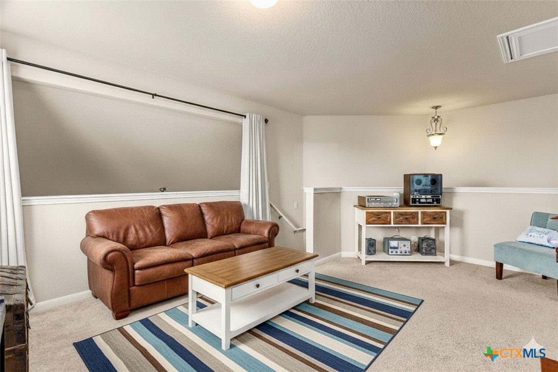 2909 Oak Branch Ridge New Braunfels, TX 78130 - Photo 25 of 39 second living area upstairs virtually staged, home is vacant