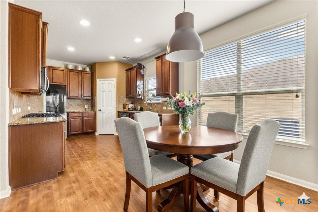 2909 Oak Branch Ridge New Braunfels, TX 78130 - Photo 9 of 39 kitchen, some items virtually staged, home is vacant, photo without island cart