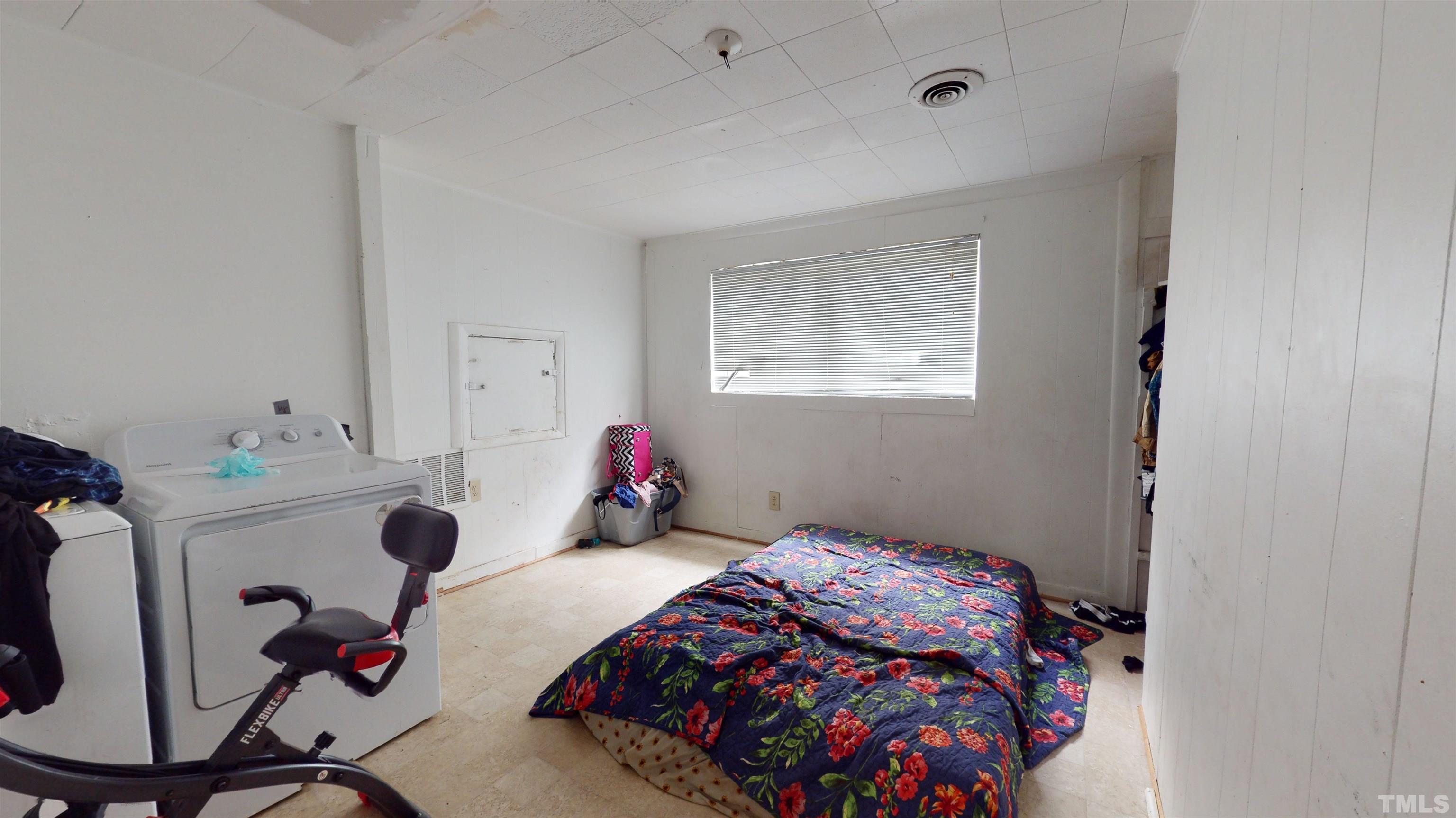 1101 Kitt Place Raleigh, NC 27610 - Photo 24 of 41 a bedroom with bed and a window