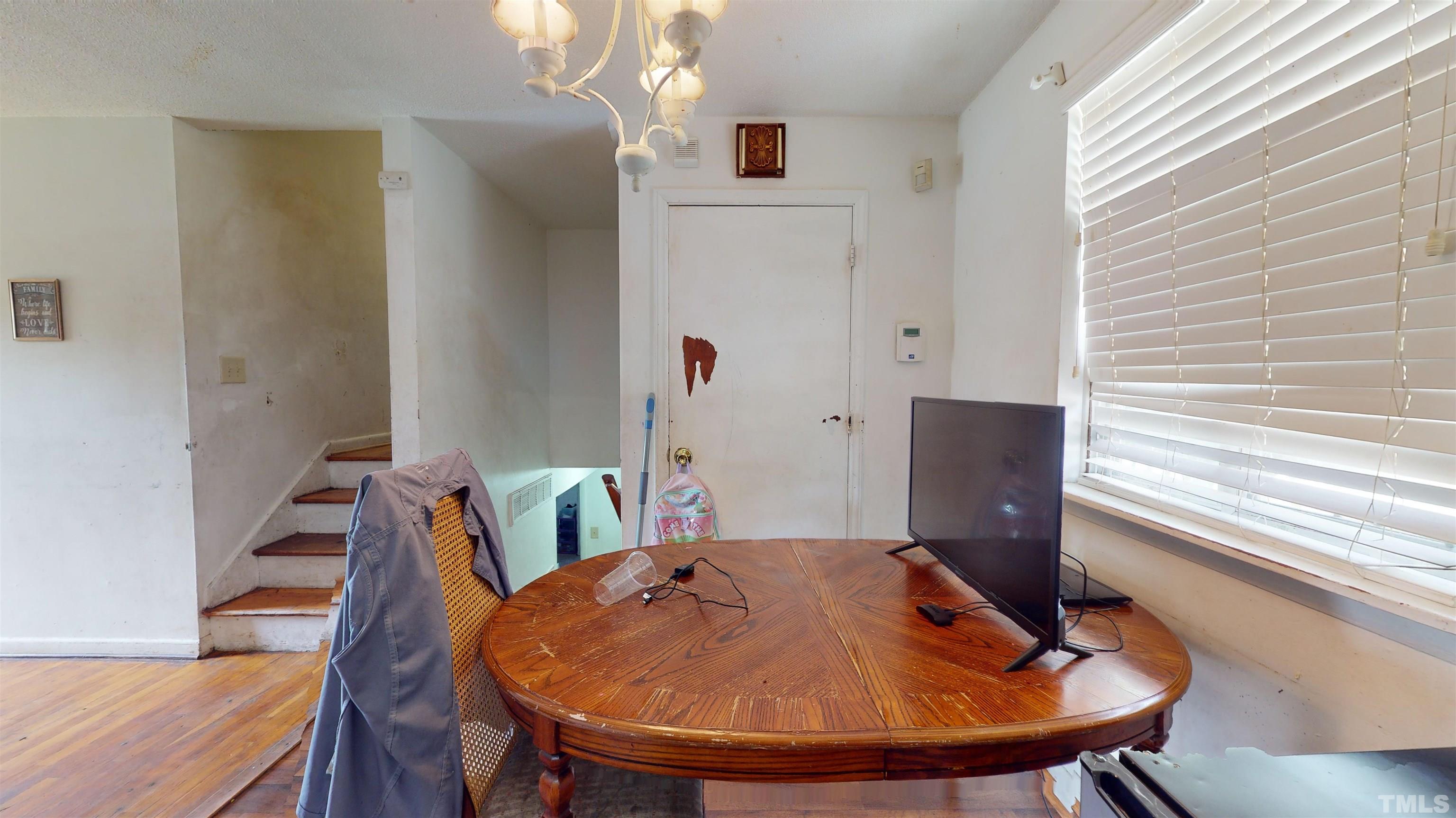 1101 Kitt Place Raleigh, NC 27610 - Photo 10 of 41 a view of a dining room with furniture and wooden floor