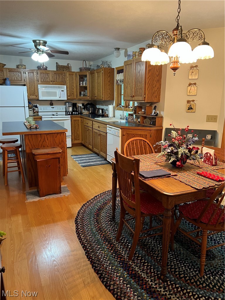 4583 Baldwin Road Kingsville, OH 44048 - Photo 7 of 35 Kitchen 22 x 13 with center island and dining area with sliders to the rear deck . Kitchen appliances included.