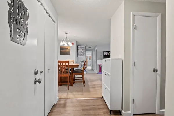 a view of a livingroom with furniture and front door