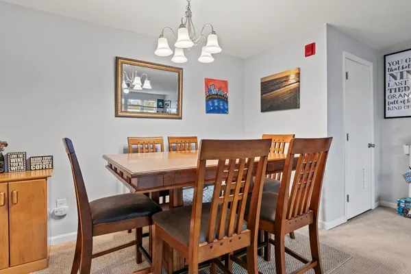 a view of a dining room with furniture