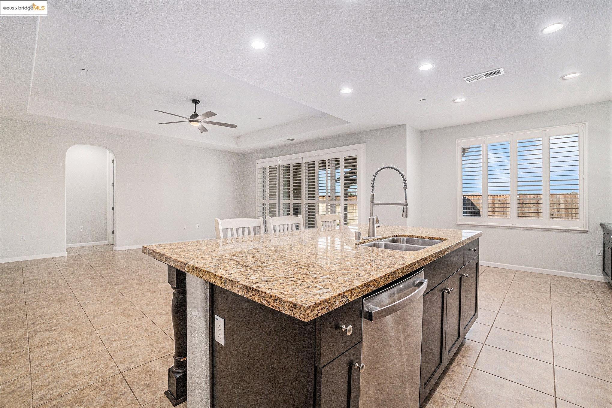 31 Rustic Court Oakley, CA 94561 - Photo 12 of 52 a kitchen with a stove a sink and a refrigerator