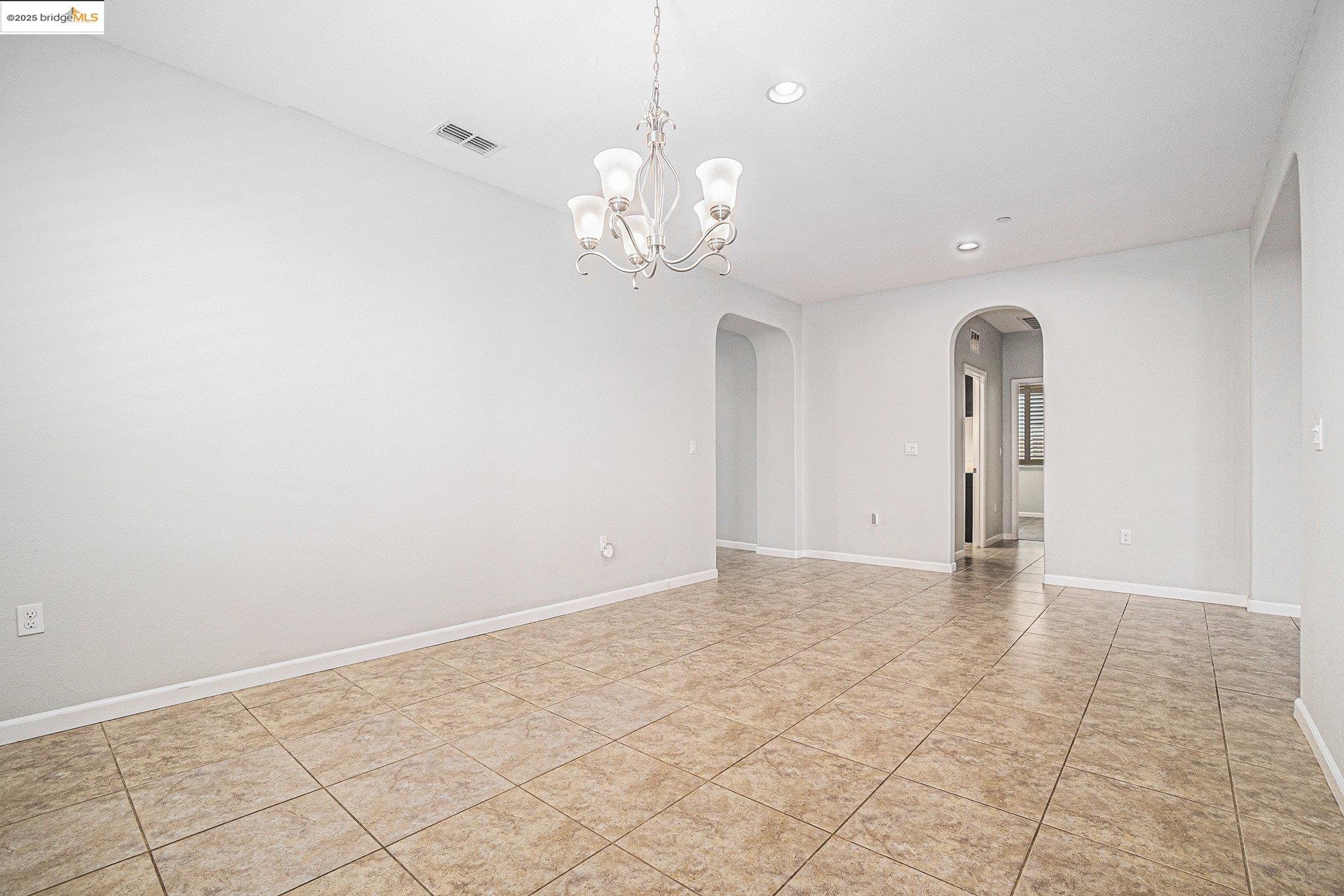 31 Rustic Court Oakley, CA 94561 - Photo 13 of 52 a view of an empty room with chandelier