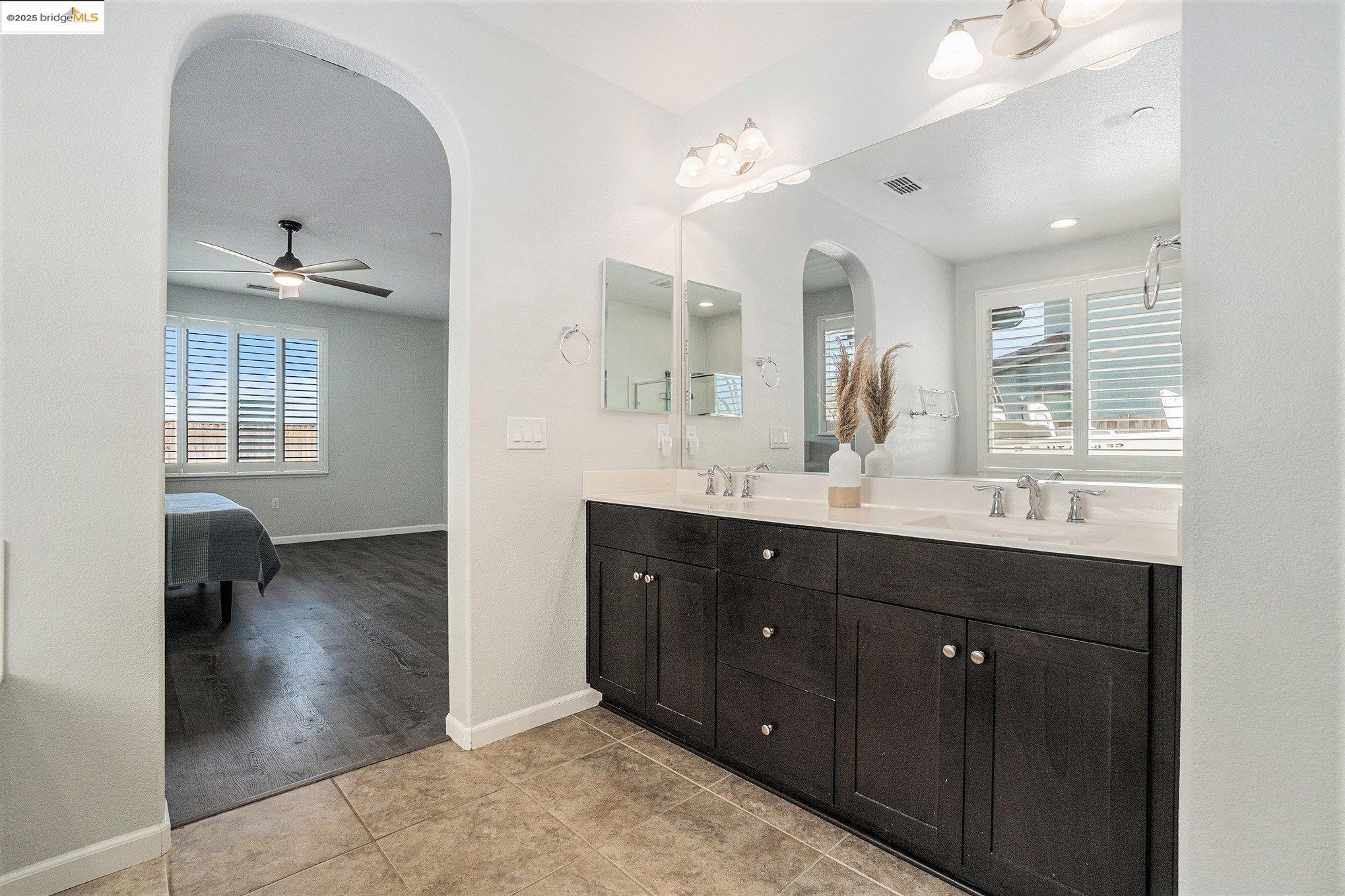 31 Rustic Court Oakley, CA 94561 - Photo 23 of 52 a spacious bathroom with a double vanity sink a mirror and a shower