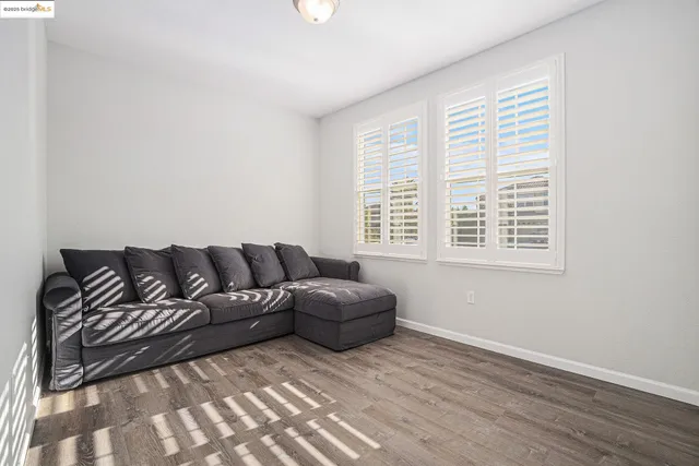 a spacious bathroom with a double vanity sink a mirror and a shower