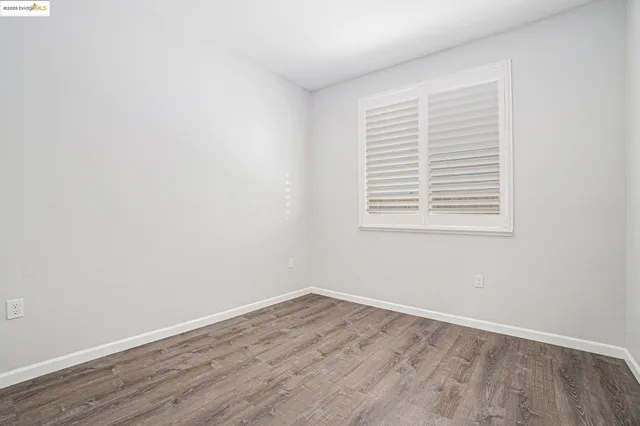 a view of livingroom with hardwood floor and window