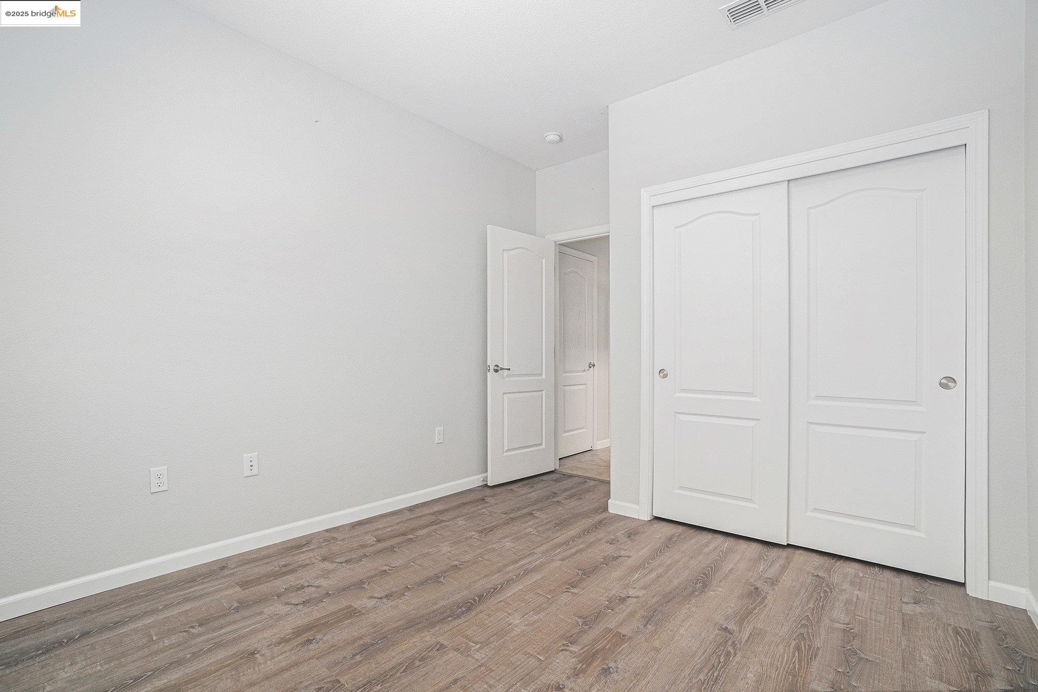 31 Rustic Court Oakley, CA 94561 - Photo 29 of 52 a view of an empty room with wooden floor