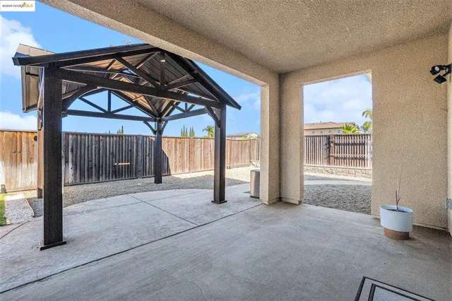 a bathroom with a sink a toilet a tub and shower
