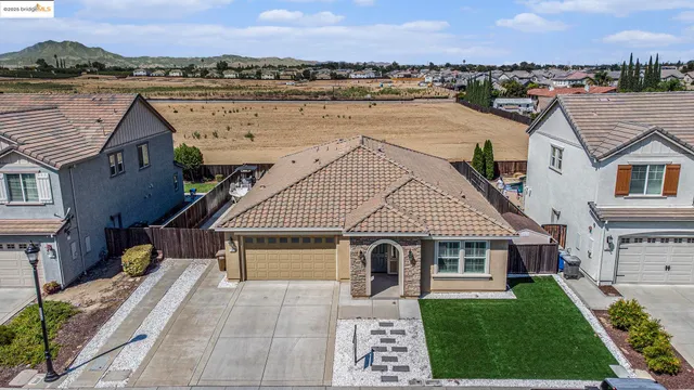 an aerial view of a city with lots of residential buildings